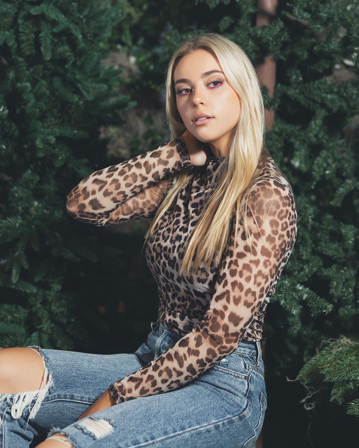 Morgan Raine wore a Animal Print Top and Denim in Photoshoot at Texas