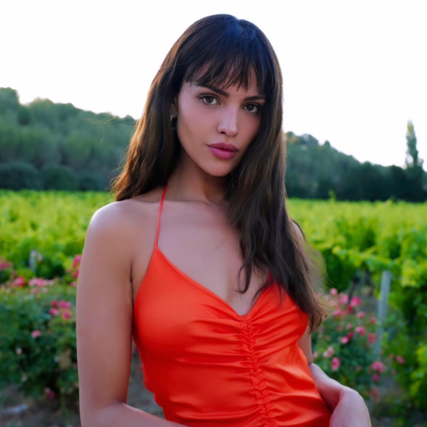 Eiza Gonzalez photos in a orange color dress on Instagram