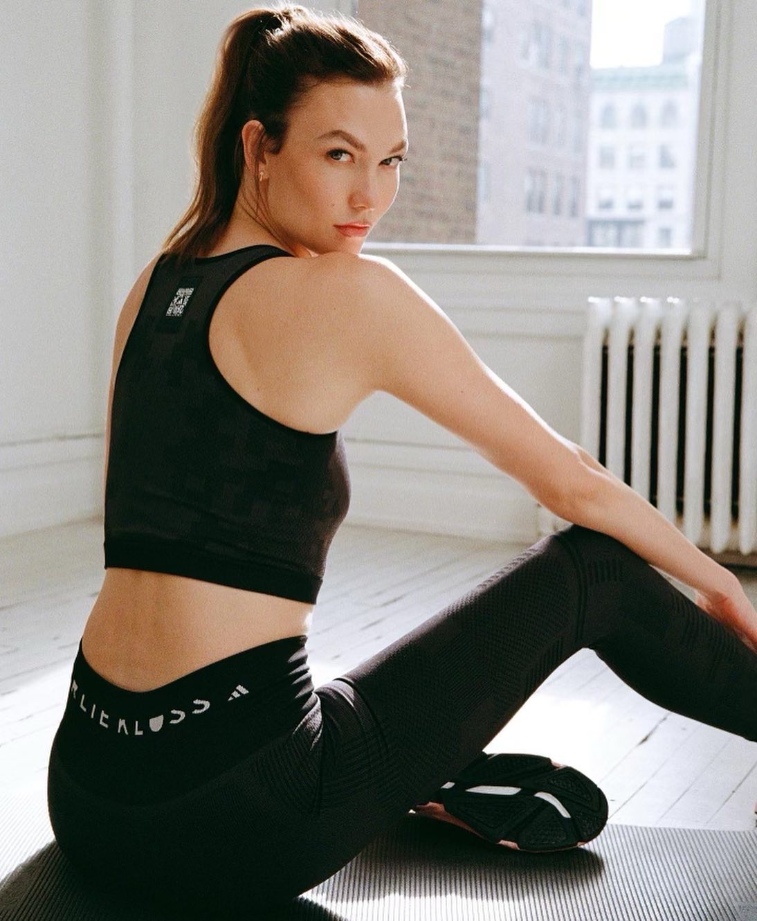 Karlie Kloss promotes adidas x Karlie Kloss Seamless Knit Layered Top and Bottom