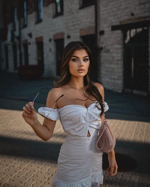 Valeria Vasilieva seen Off Shoulders White Short Dress at  Tallinn, Estonia