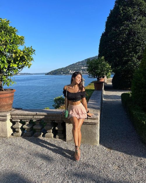 Ambra Gutierrez seen in Off Shoulder Black Frill Top with Light Pink Short Skirt 1