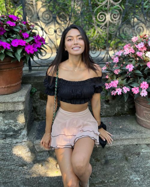 Ambra Gutierrez seen in Off Shoulder Black Frill Top with Light Pink Short Skirt 3