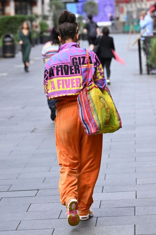 Eliza Rose in Orange Lower with Typography Jacket After Leaves Heart Radio in London
