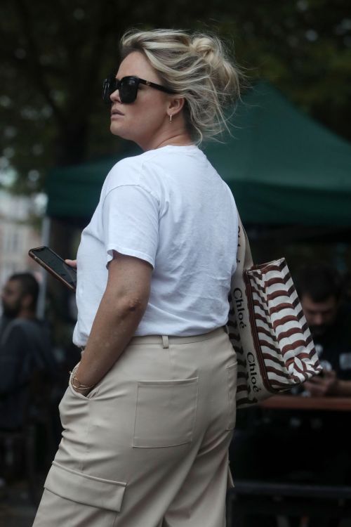 Emily Atack in White Top with Loose Pants on the Set of BBC Documentary in London 5