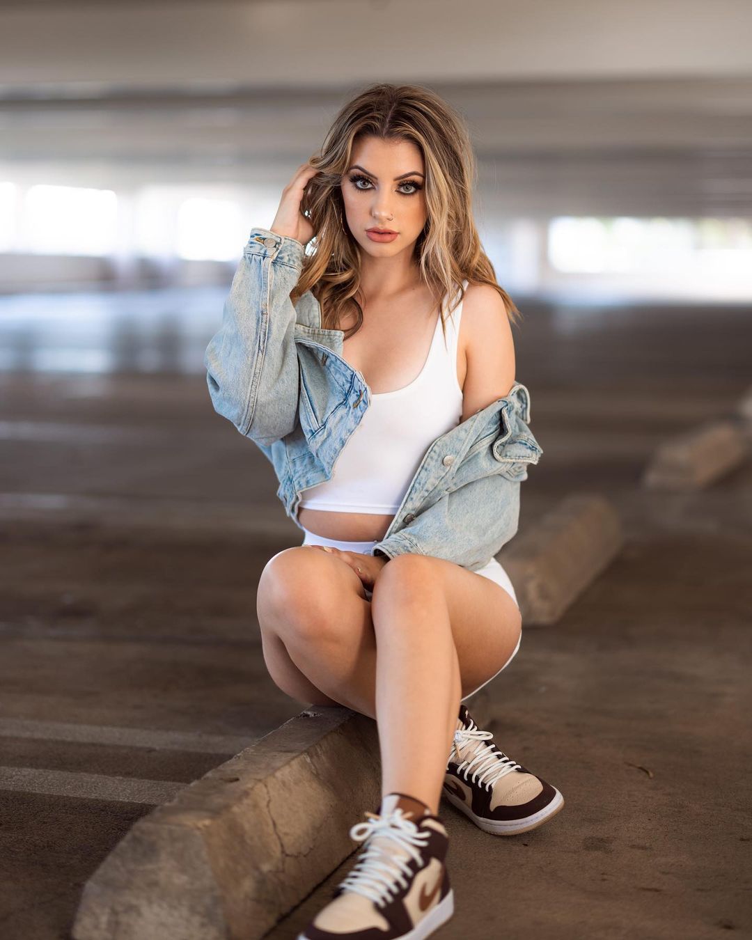 Lexie flashes her toned legs in Denim Jacket with Shorts during photoshoot