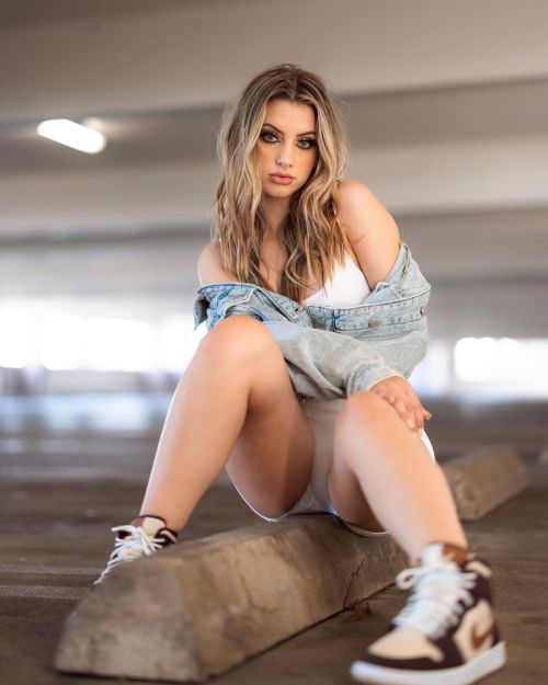 Lexie flashes her toned legs in Denim Jacket with Shorts during photoshoot
