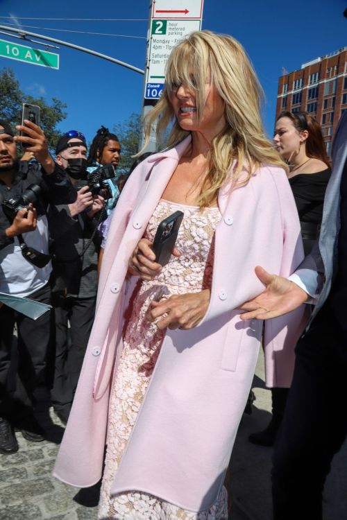Christie Brinkley seen in White Floral Dress at Michael Kors Show in New York, Sep 2022
