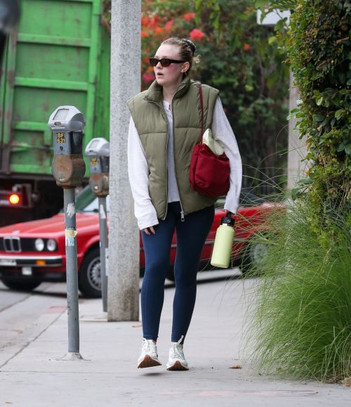 Dakota Fanning in Puffer Jacket and Tights Day Out in Los Angeles, Oct 2022