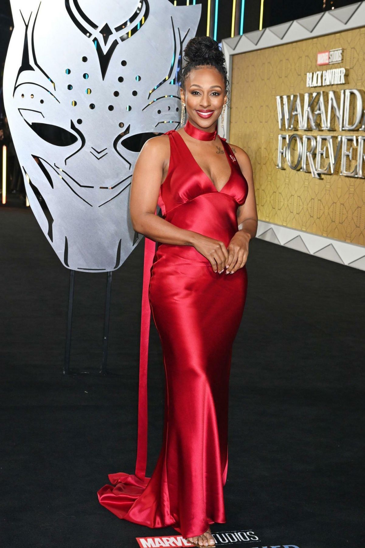 Alexandra Burke seen in Red Dress at Black Panther: Wakanda Forever Premiere in London