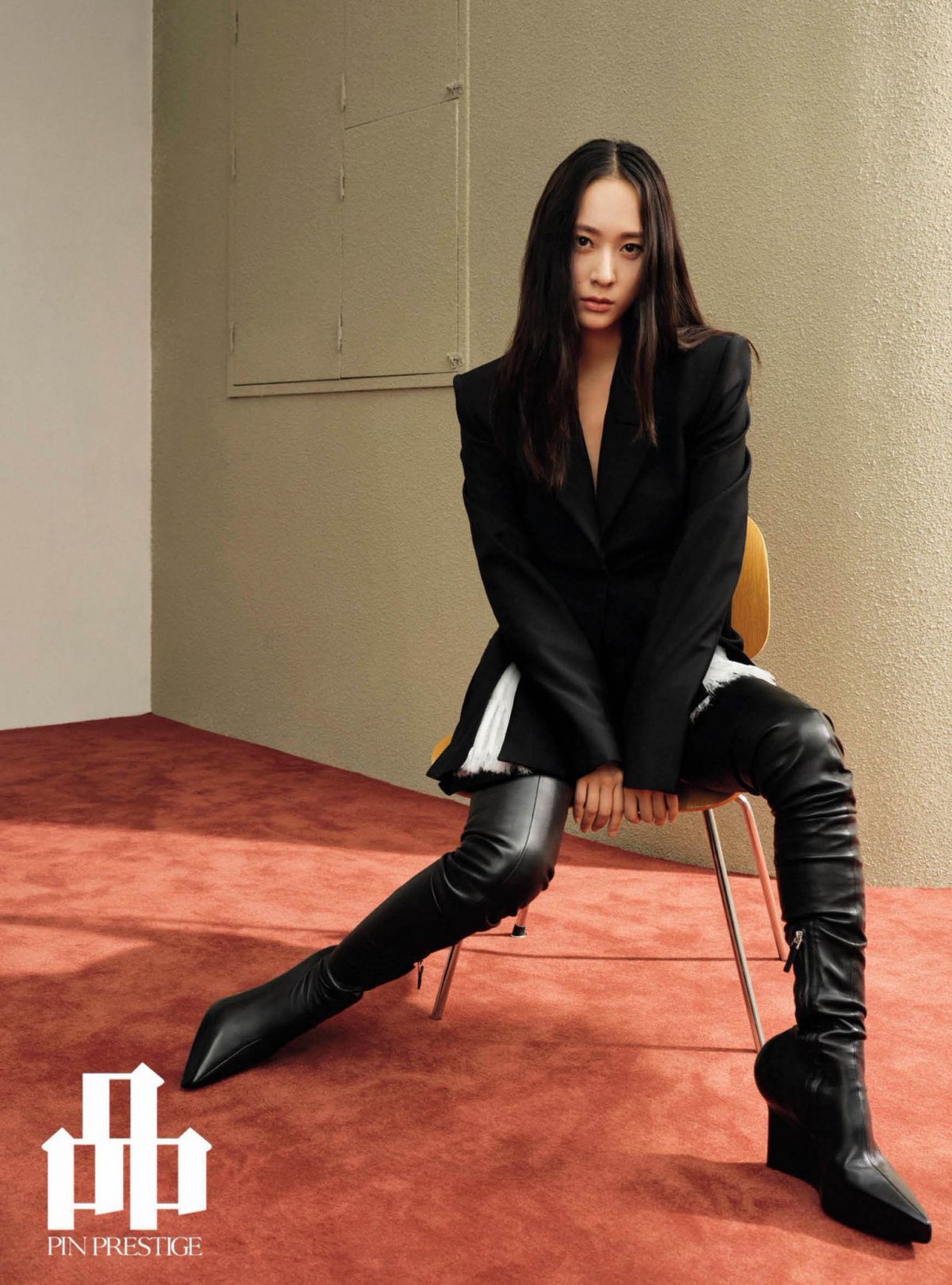 Krystal Jung Sitting on Chair during photoshoot