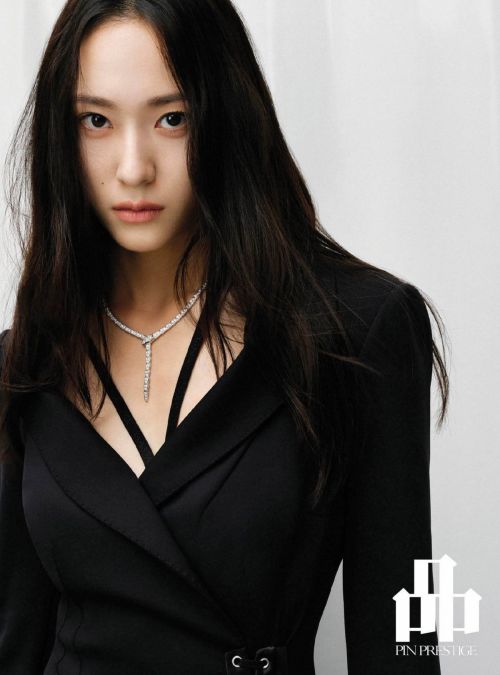 Krystal Jung Sitting on Chair during photoshoot