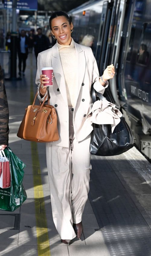 Rochelle Humes seen in High Neck Top with Suits in Manchester, Oct 2022 2