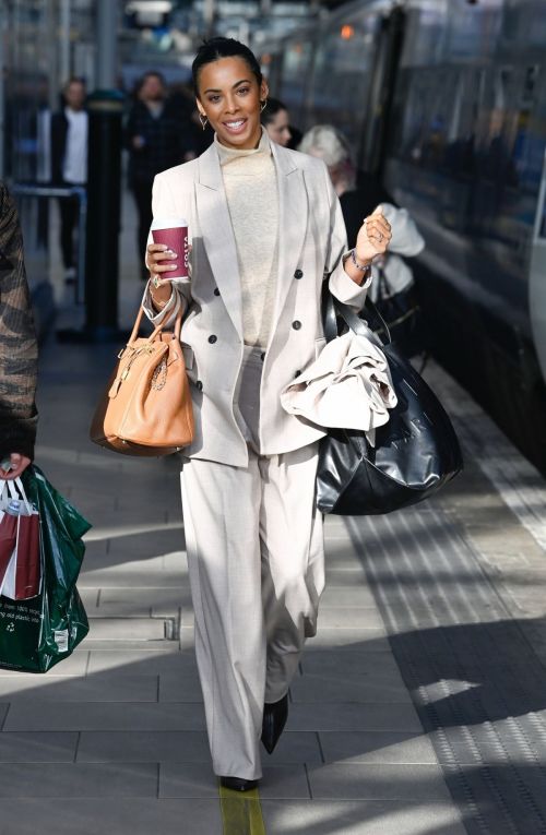 Rochelle Humes seen in High Neck Top with Suits in Manchester, Oct 2022 3