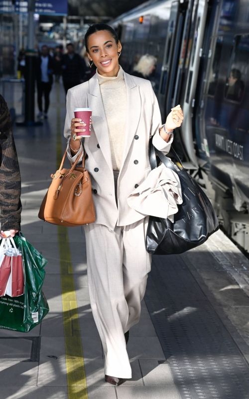 Rochelle Humes seen in High Neck Top with Suits in Manchester, Oct 2022 4
