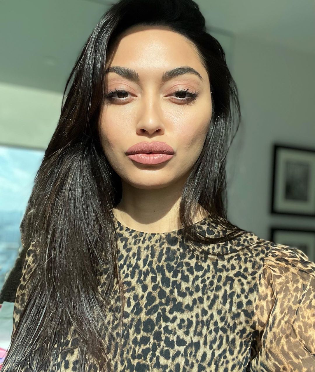 Ambra Gutierrez shared her selfies on Social Media in Animal Print Top at Miami Beach, Florida