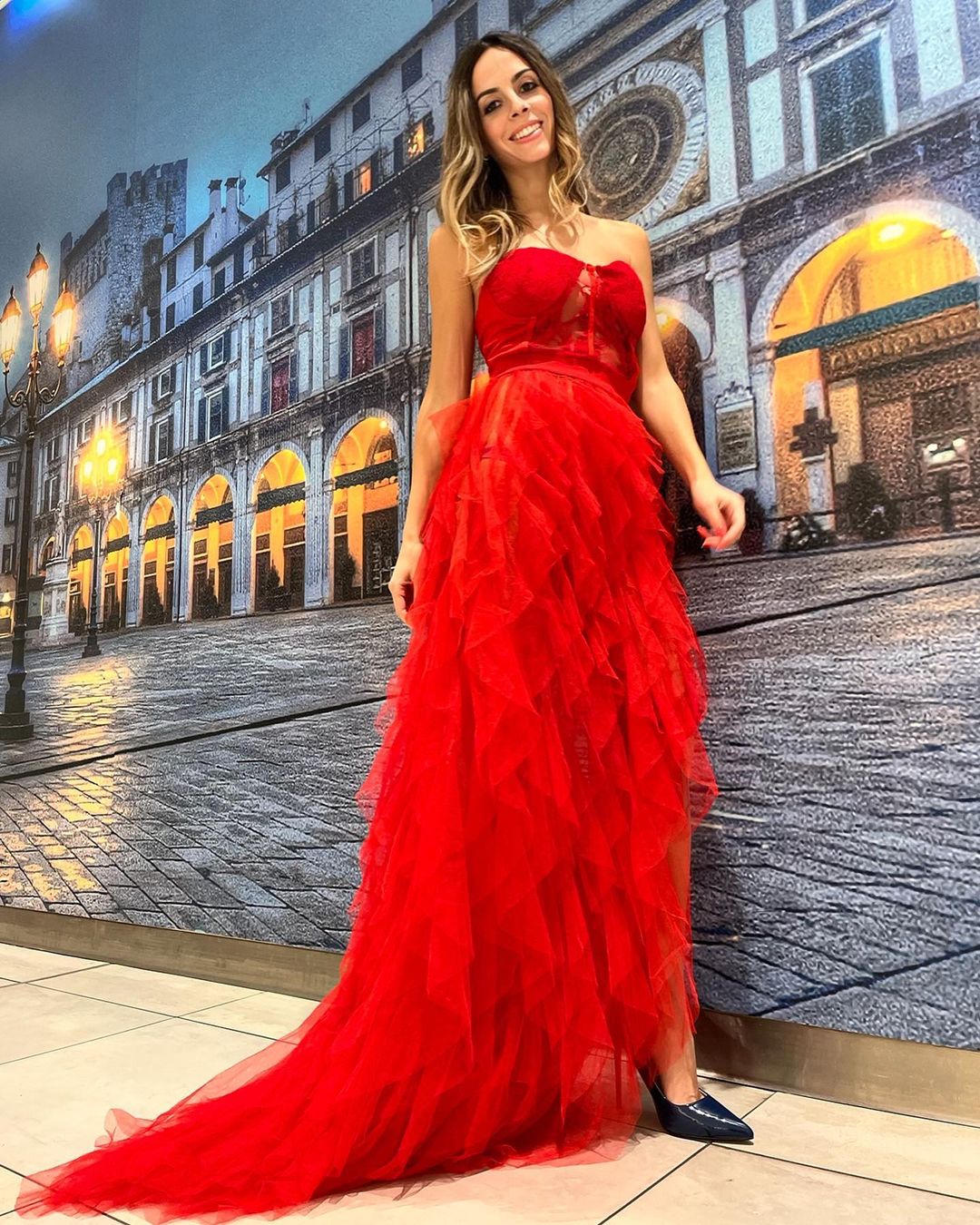 Laura Dotti wears Mew Mews Red Long Dress at Brescia Capitale della Cultura 2023