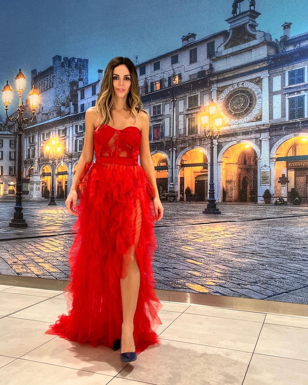 Laura Dotti wears Mew Mews Red Long Dress at Brescia Capitale della Cultura 2023