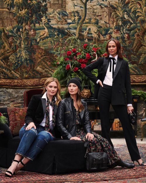 Model photoshoot of Lily Aldridge with Australian model Georgina Burke and Supermodel Joan Smalls in front of a beautiful artwork