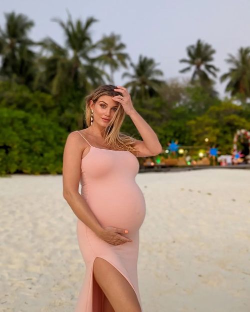 Pregnant Ashley James Show her Baby Bump at Sun Island Resort & Spa Beach, Jan 2023