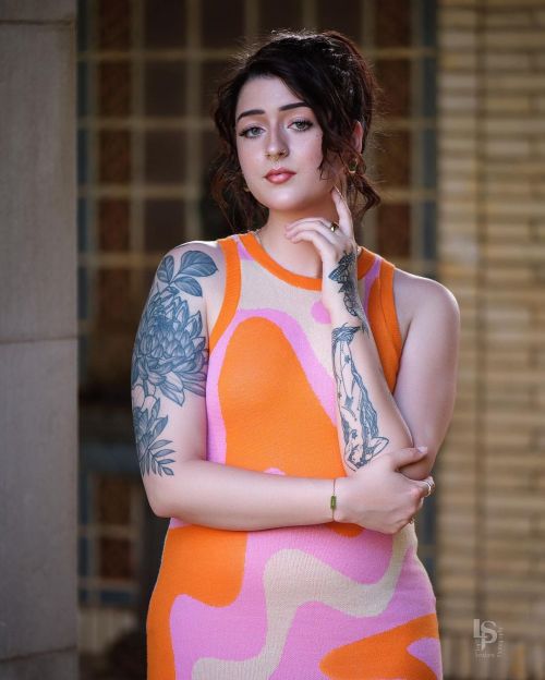 Hannah Garrett poses in Multi Color Dress Photo Shoot Done by Light Sessions Photography 3