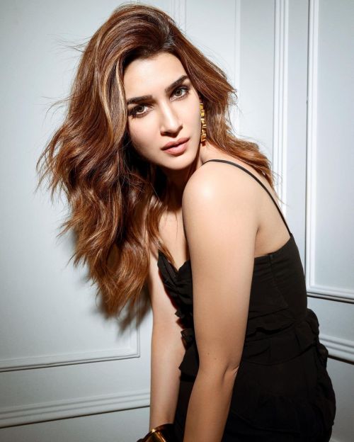 Kriti Sanon wears PRERTO Black Dress with DHORA Jewelery During Photoshoot, Feb 2023 3