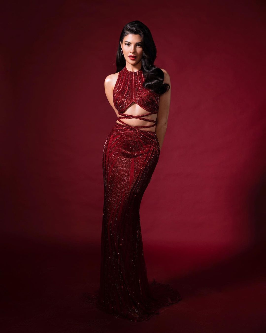 Jacqueline Fernandez stuns in scarlet red gown for Filmfare photoshoot | Fashion designer Bhawna Rao