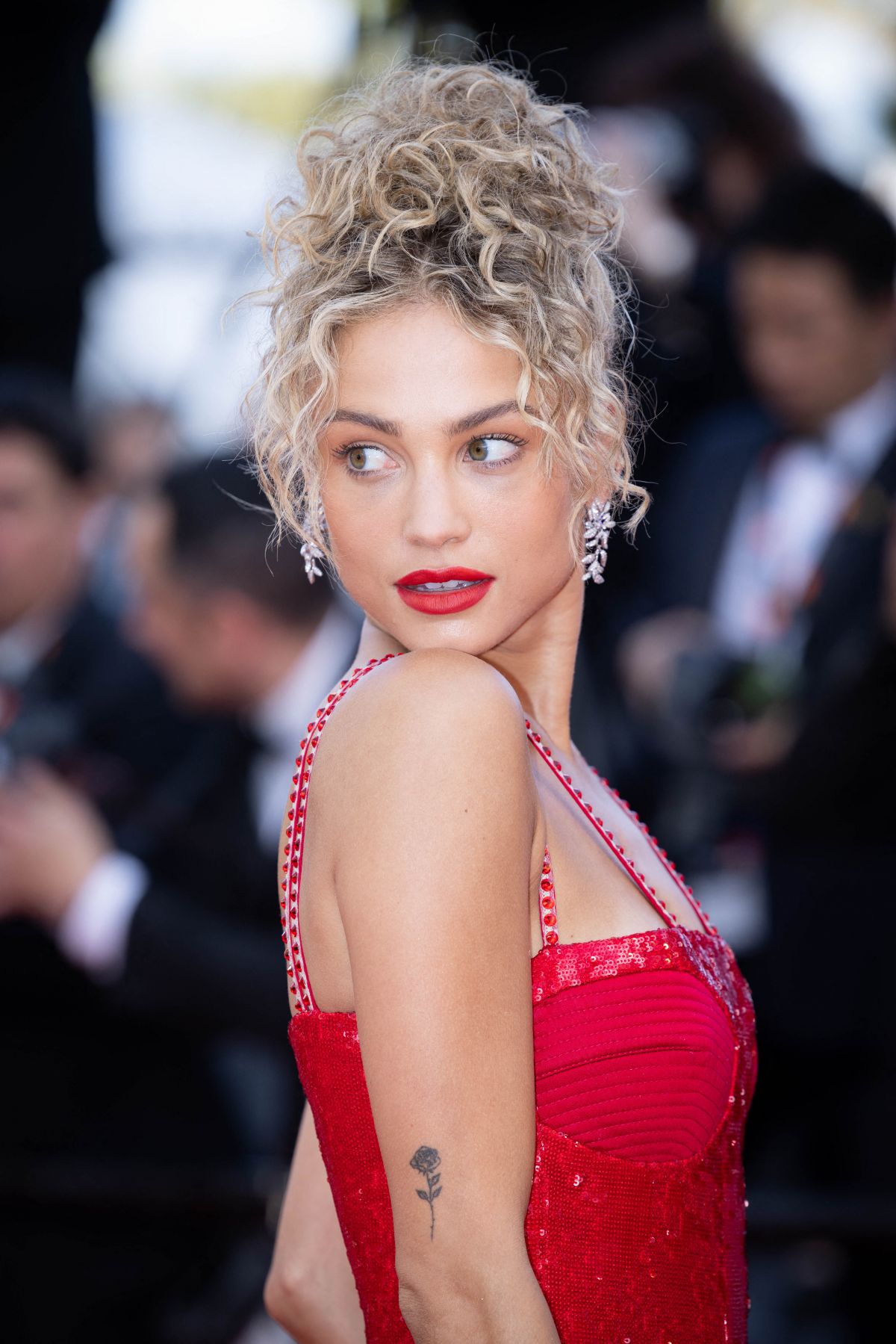 Rose Bertram Stuns in Genny Dress and Ole Lynggaard Copenhagen Jewelry at 76th Cannes Film Festival