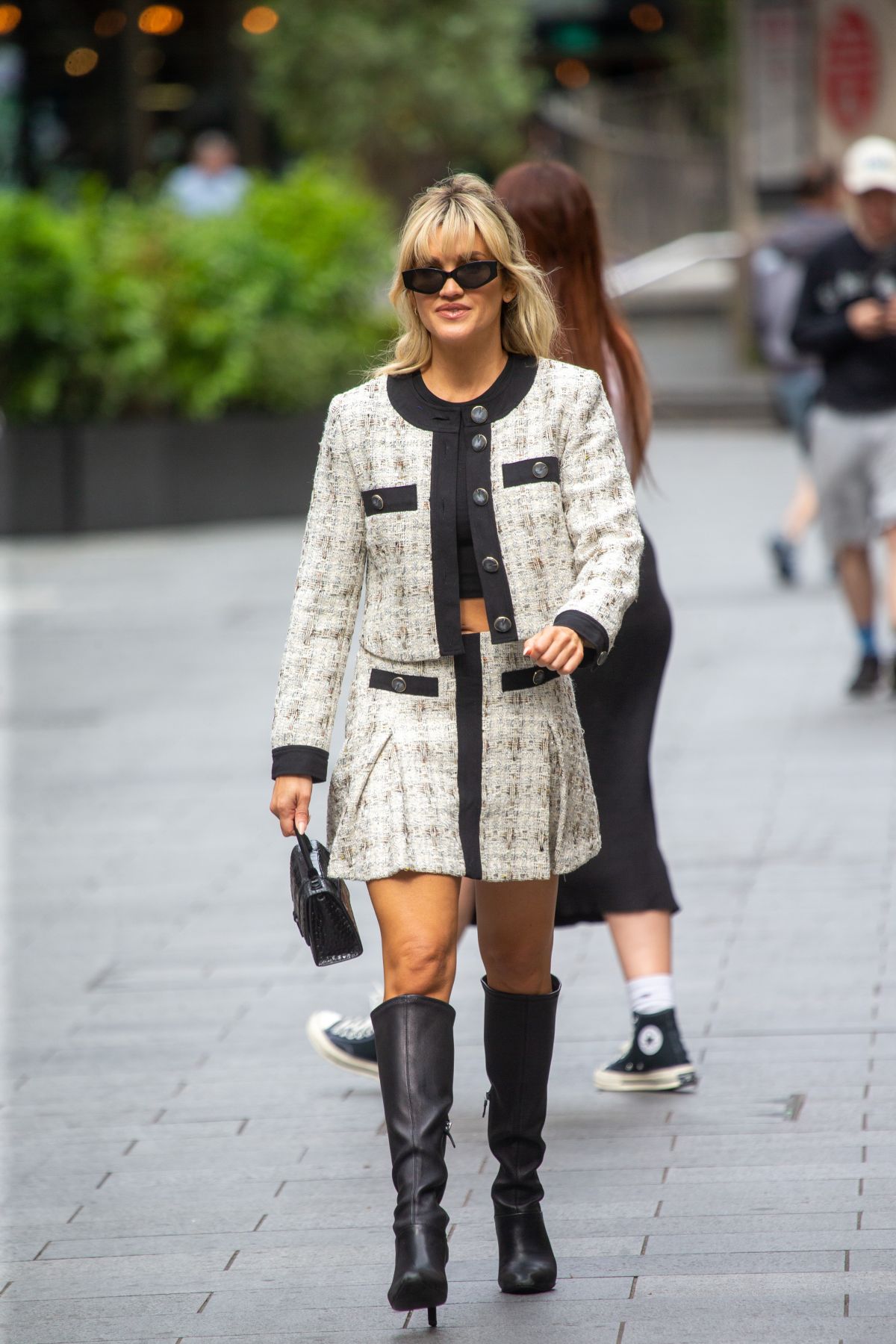 Ashley Roberts: Stunning Style Statement with Black Boots and Flashed Legs 06/26/2023