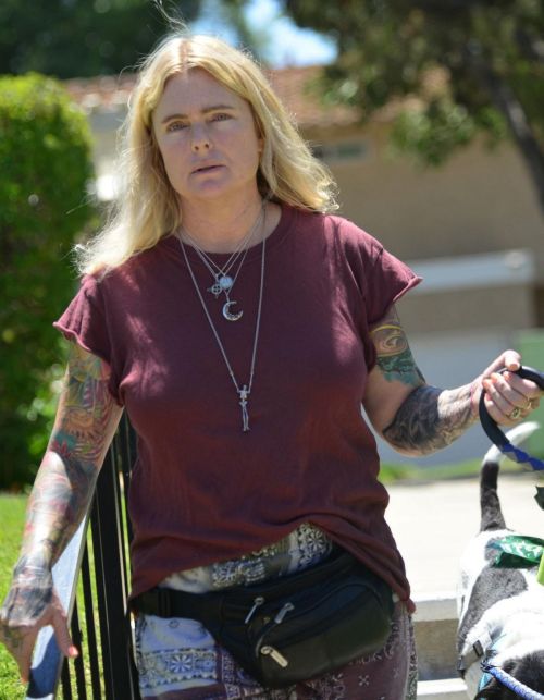 Erika Eleniak Enjoying a Stroll with Her Dog in Los Angeles 07/13/2023 1