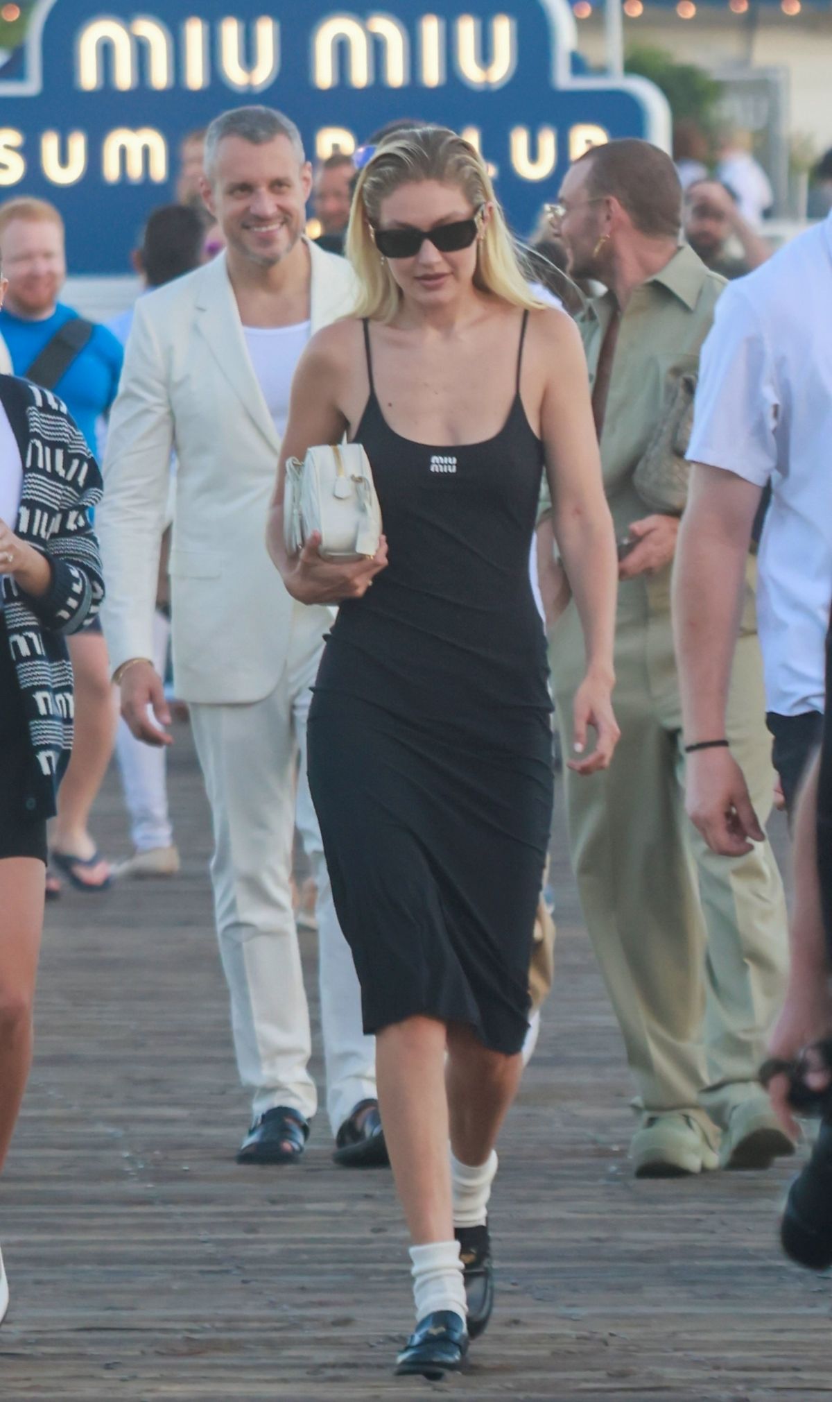 Gigi Hadid Arrives at Miu Miu Summer Club Beach Party