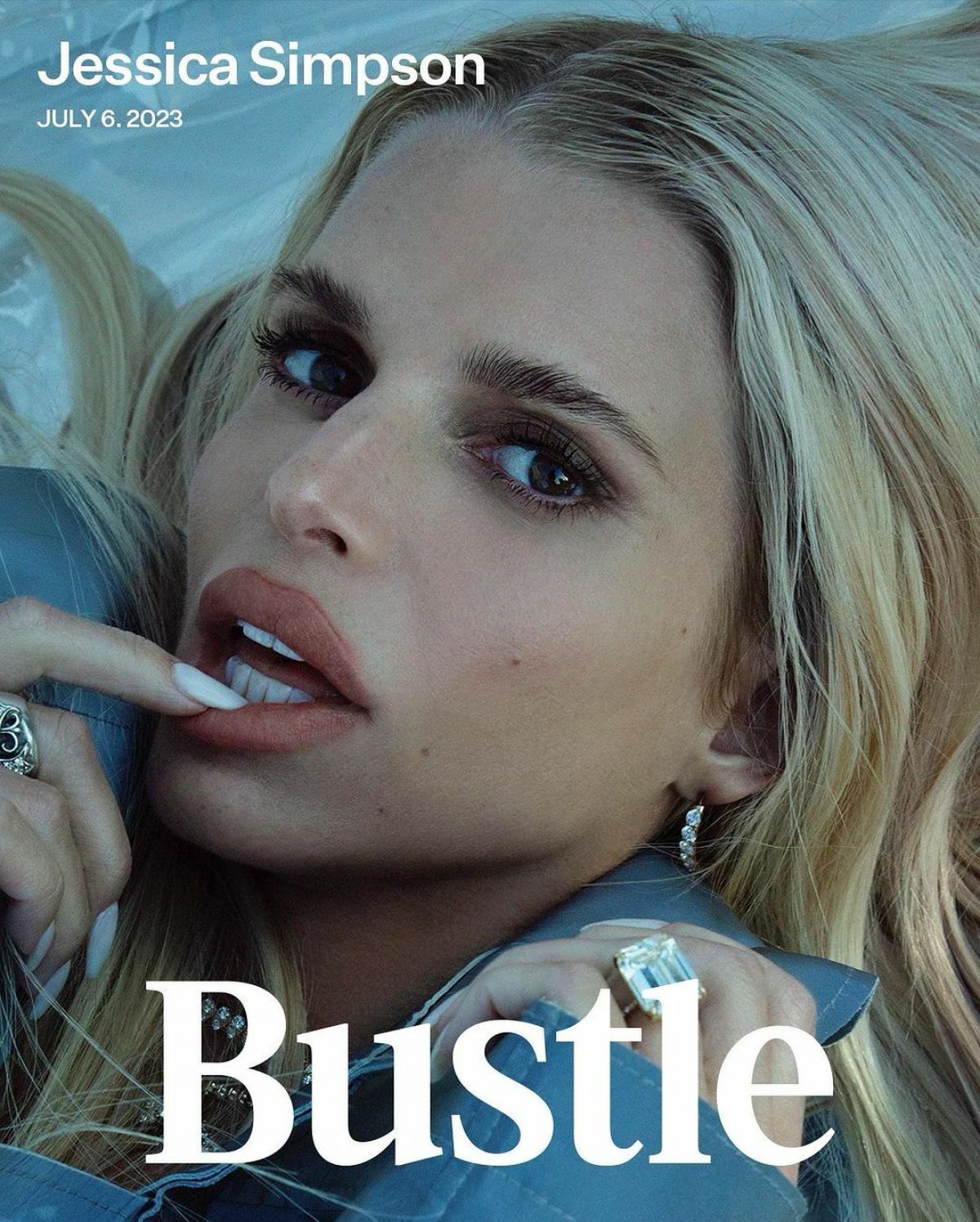 Jessica Simpson Shines on Bustle Magazine Cover: Flaunting Her Legs and Unmatched Style