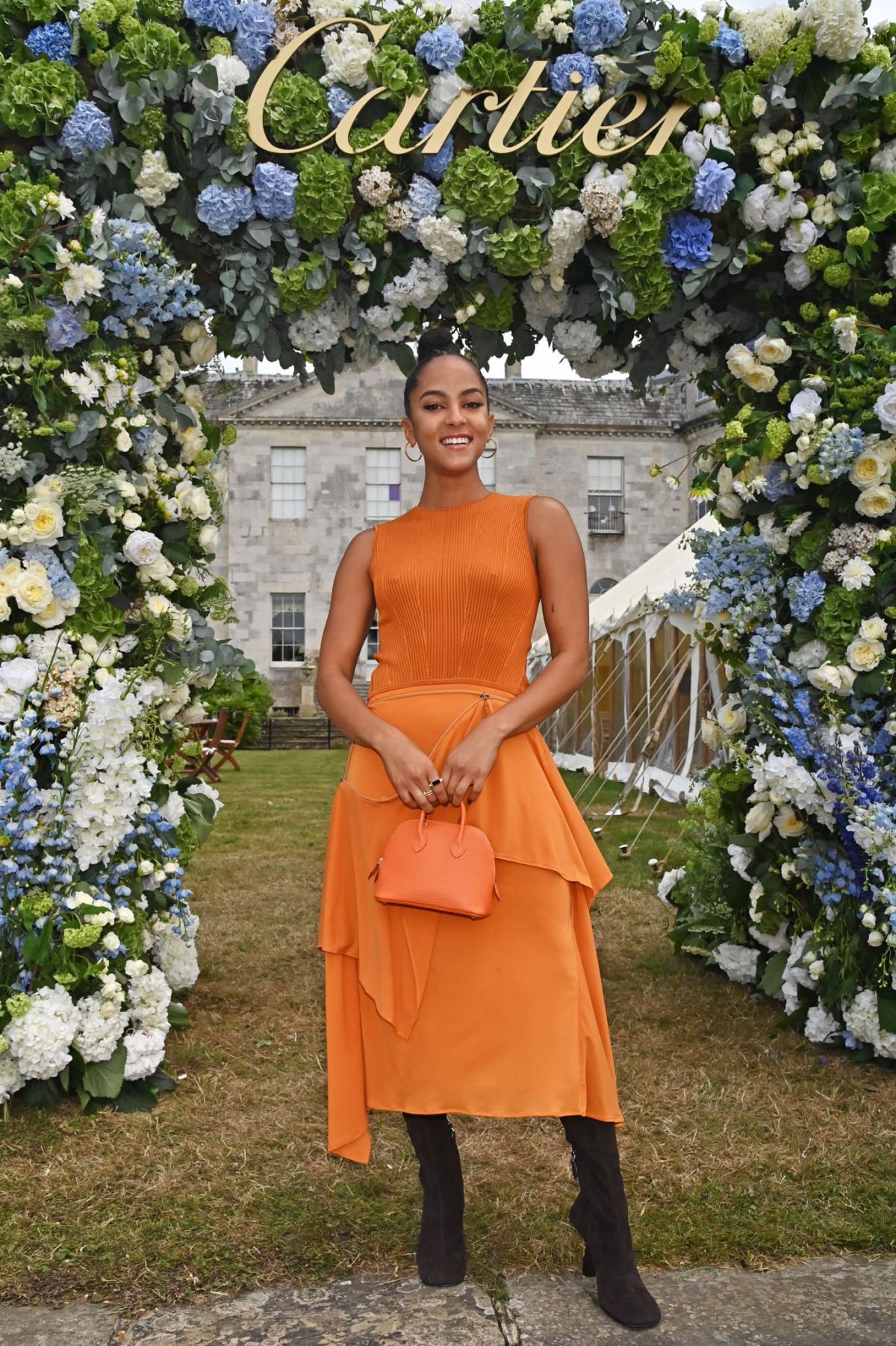 Lou Llobell Stylish Orange Dress and Long Boots at Cartier Style et Luxe in Chichester 07/16/2023