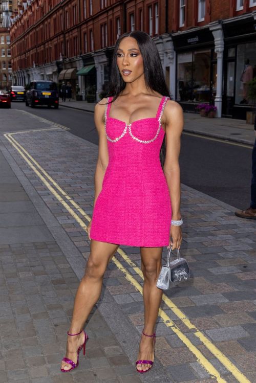 MJ Rodriguez Stuns in a Pink Dress and Flashes Her Legs at British Vogue Party in London 07/13/2023 4