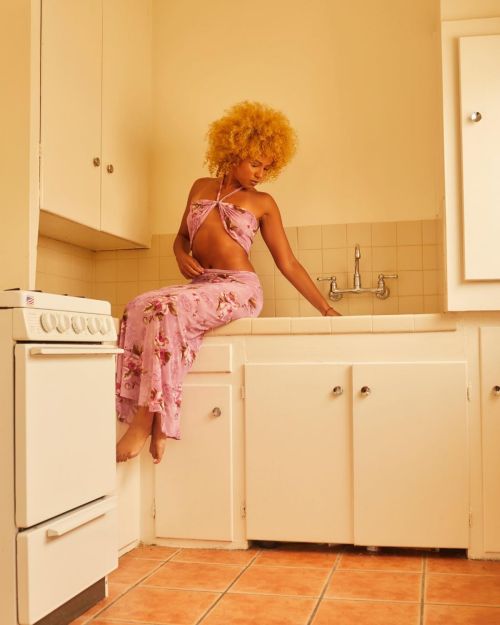 Robyn Alomar striking a pose on the kitchen countertop