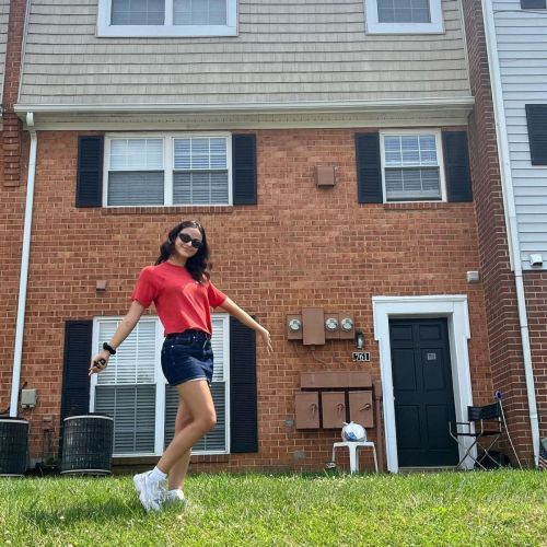 Camila Mendes Rocks Red Tshirt and Denim Skirt in Latest Photos 3
