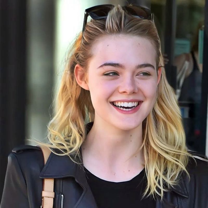 Elle Fanning Edgy Look with Black Top and Leather Jacket on Instagram