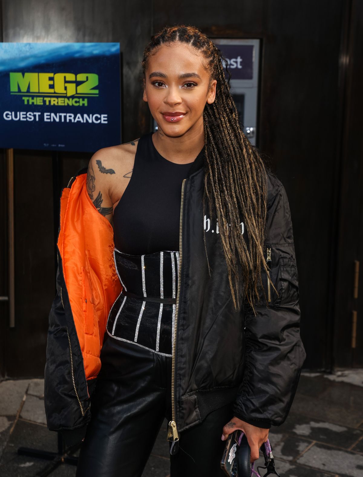Yinka Bokinni Arrives at MEG 2: The Trench Special Fan Screening
