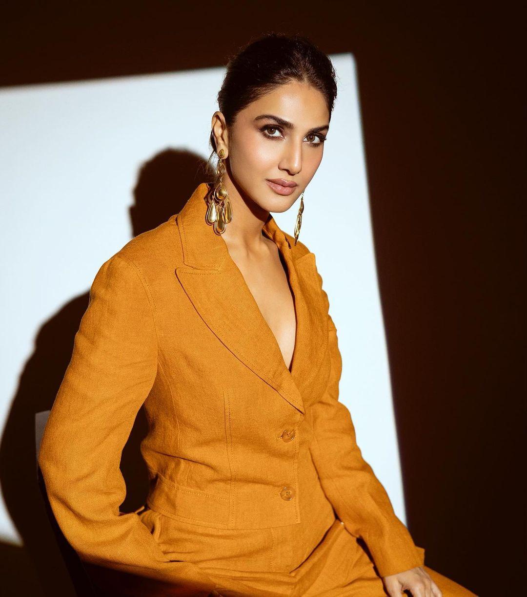 Vaani Kapoor Stuns in Mustard Suits at Brand Vision Summit 2023