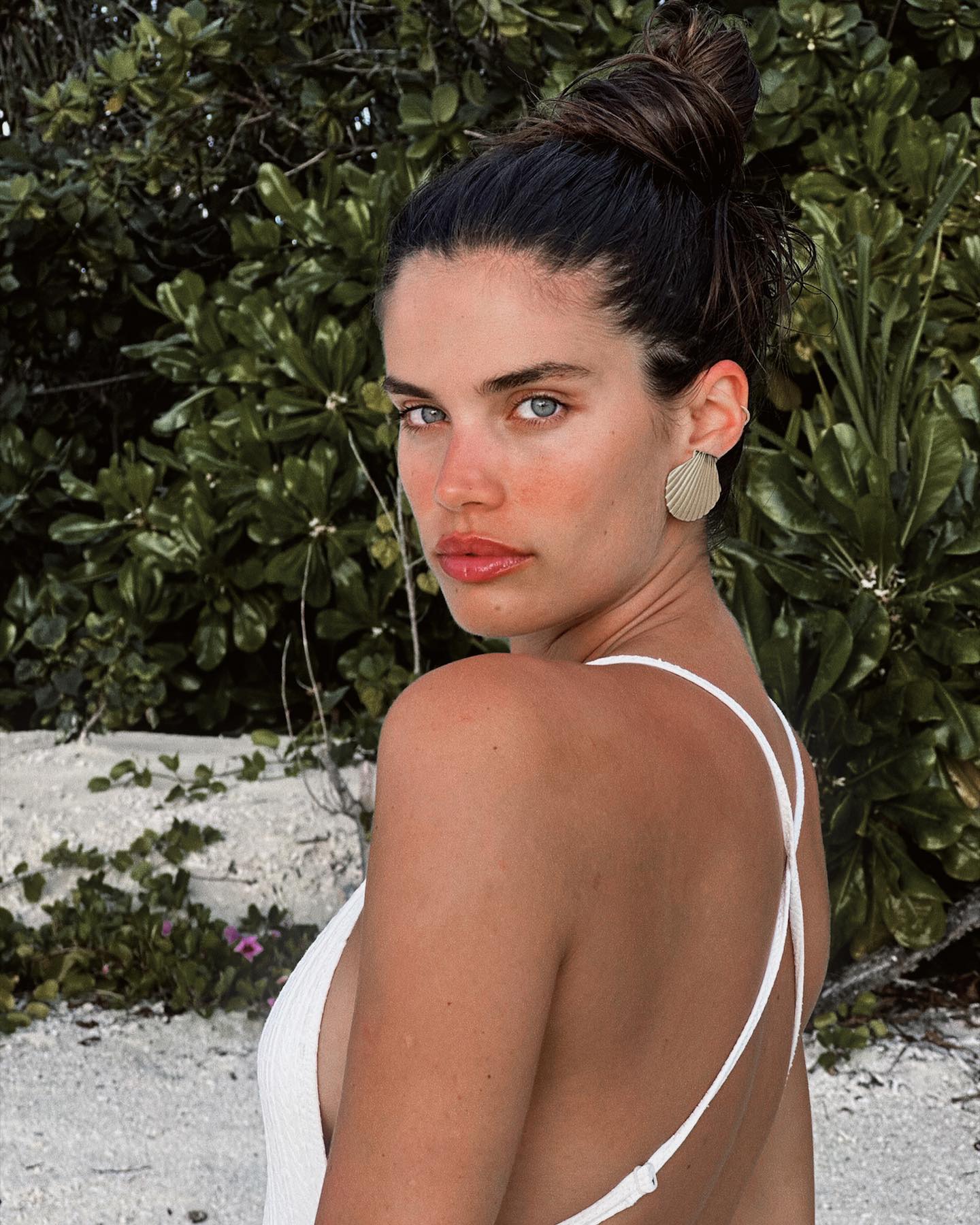 Sara Sampaio Stuns in White Swimsuit on Beach