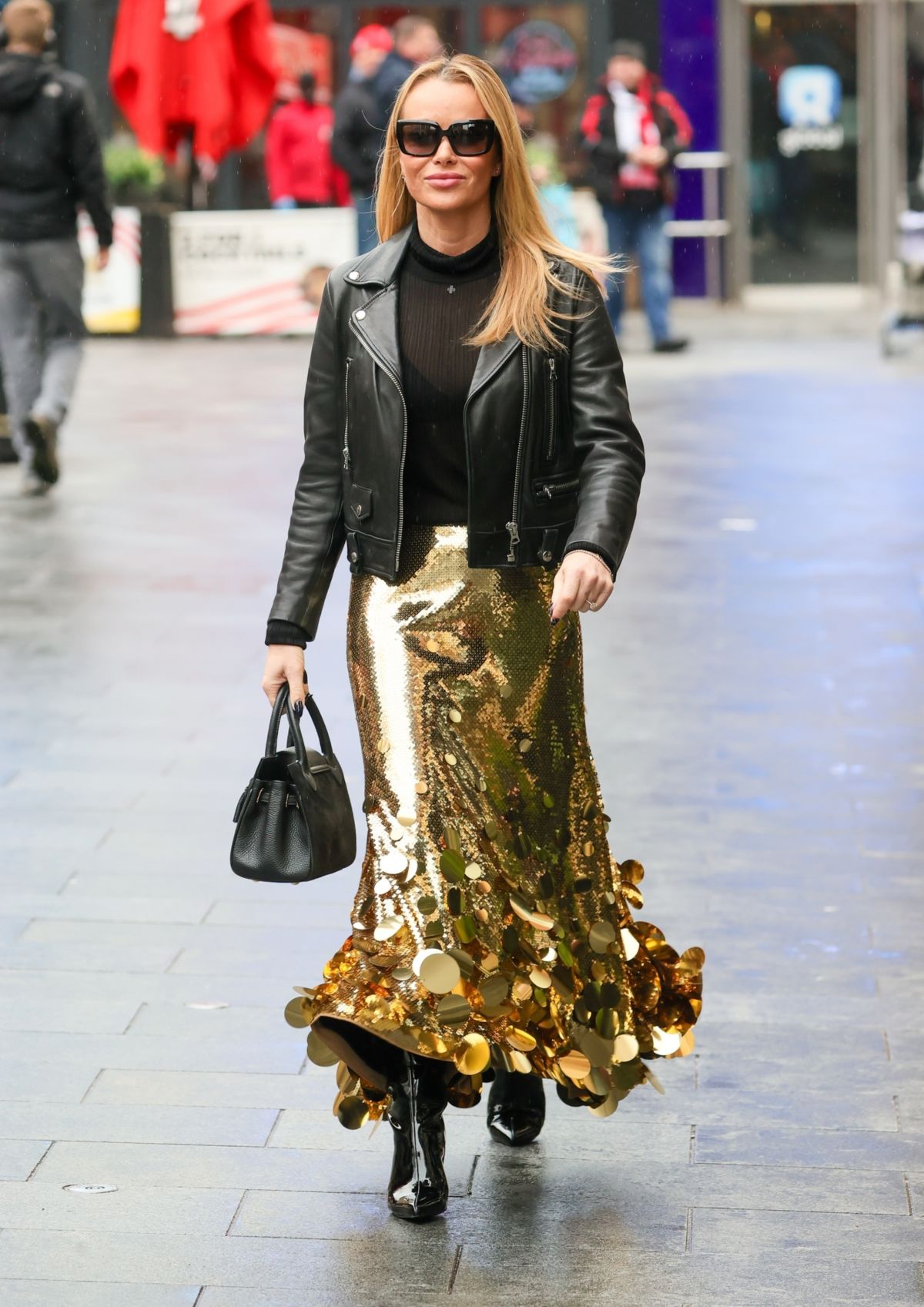 Amanda Holden stuns in chic black and golden outfit at Heart Radio London 1