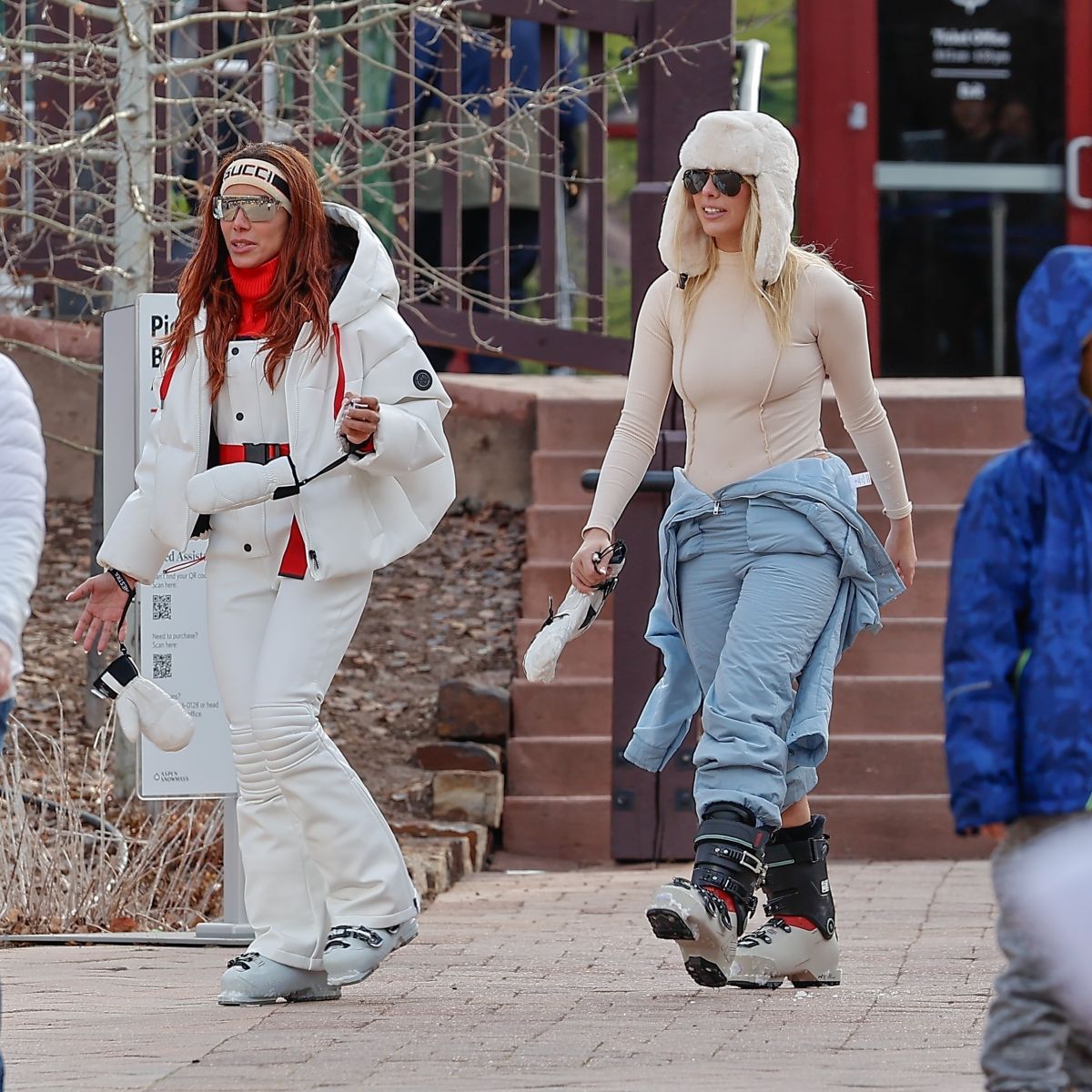 Two celebrities walking together during their Aspen vacation