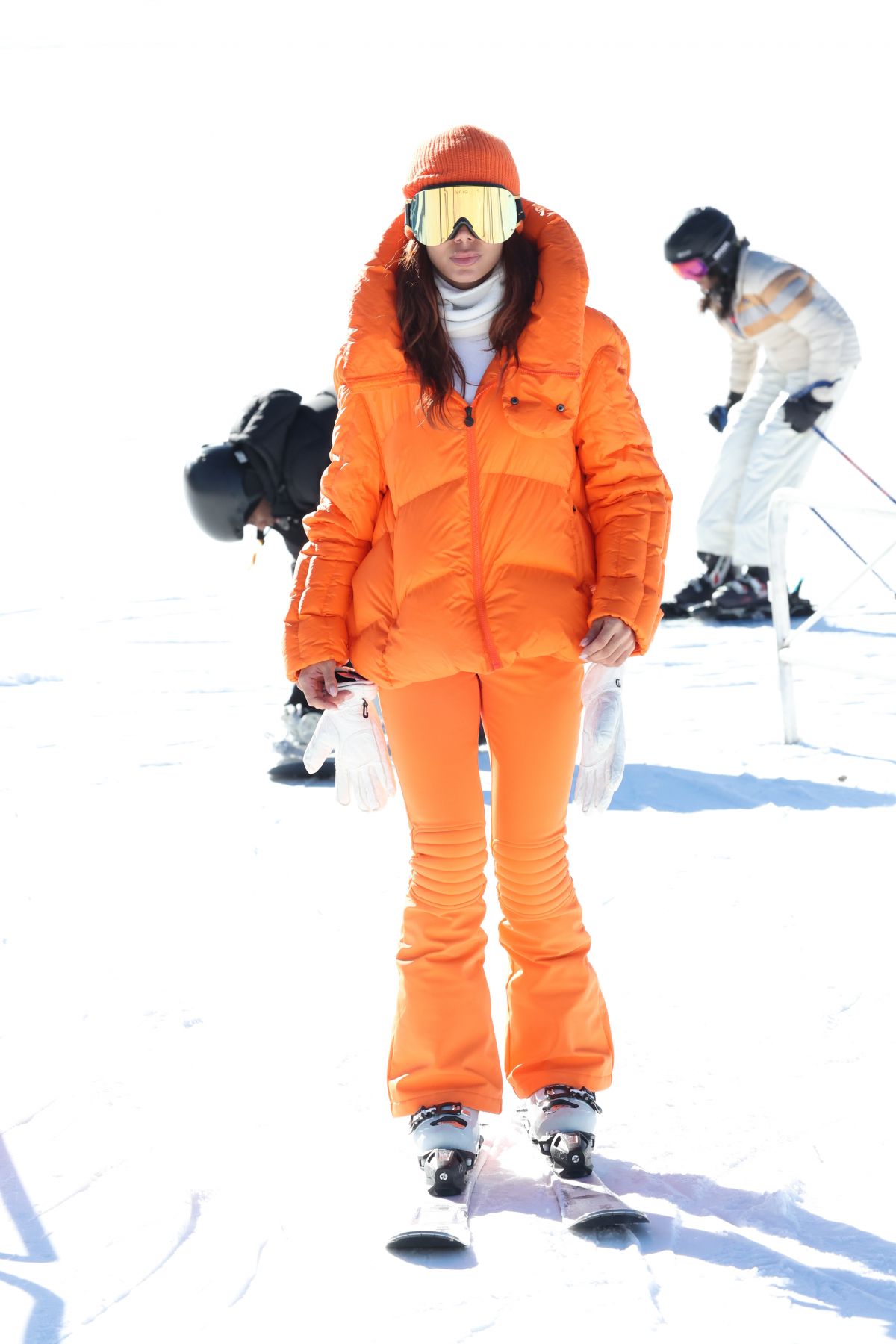 Anitta in Orange Puffer Jacket While Skiing in Aspen
