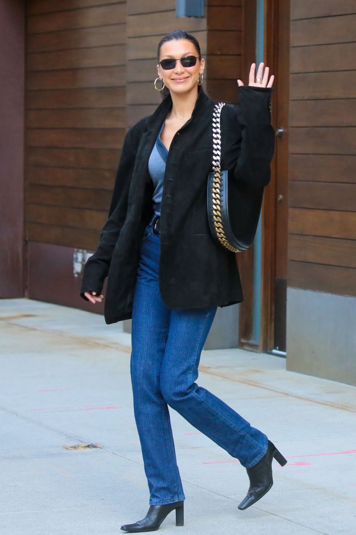 Bella Hadid in Blue V-Neck and Stella McCartney Bag in NYC