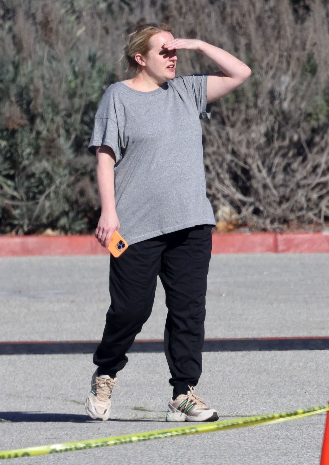 Elisabeth Moss in grey tee and black bottoms in LA 1