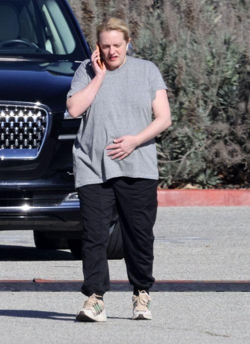 Elisabeth Moss in grey tee and black bottoms in LA 2