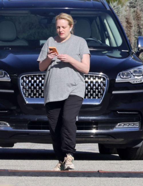 Elisabeth Moss in grey tee and black bottoms in LA 3