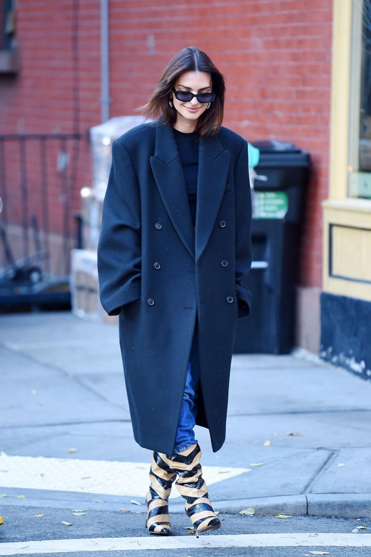 Emily Ratajkowski in Green Overcoat and Blue Denim Outfit in NYC 4