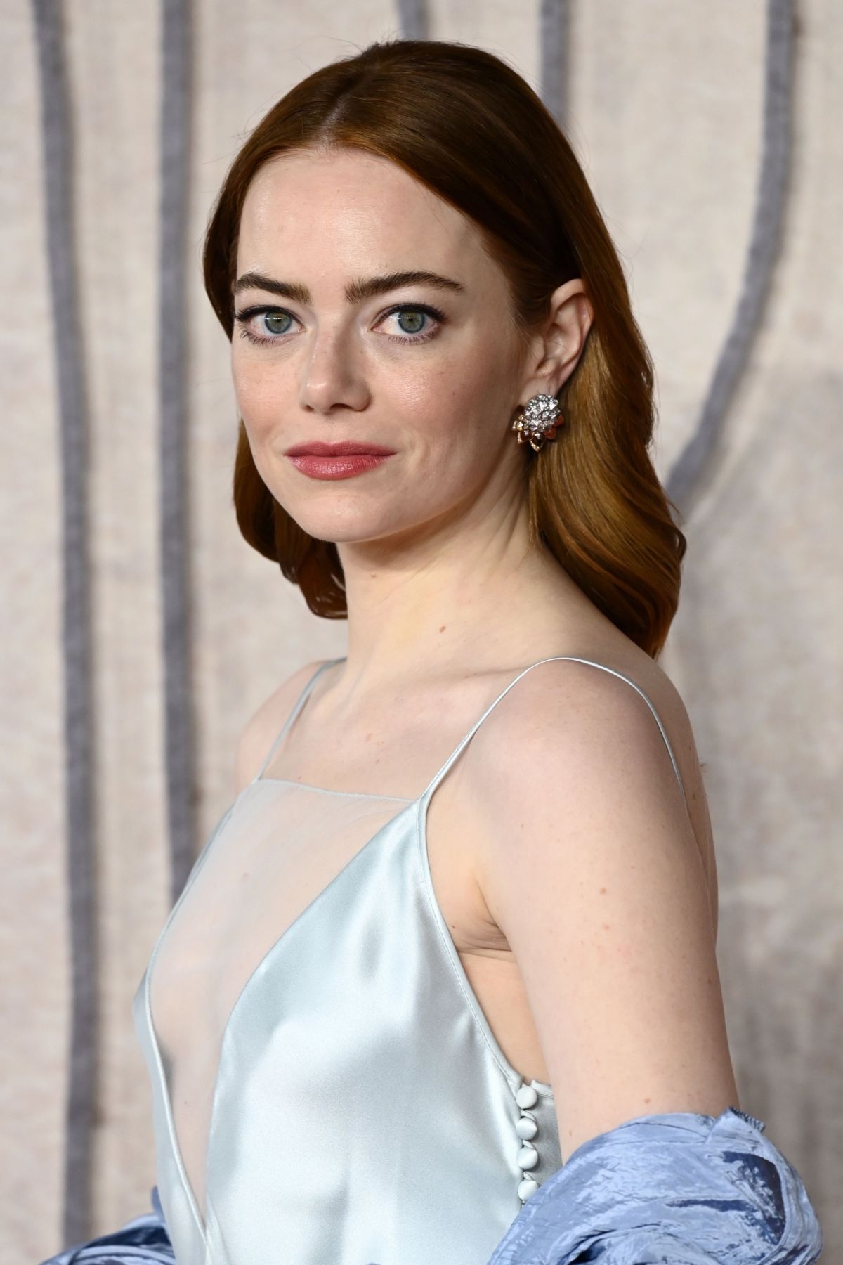 Emma Stone stuns in Satin Dress at Poor Things Premiere in London 6