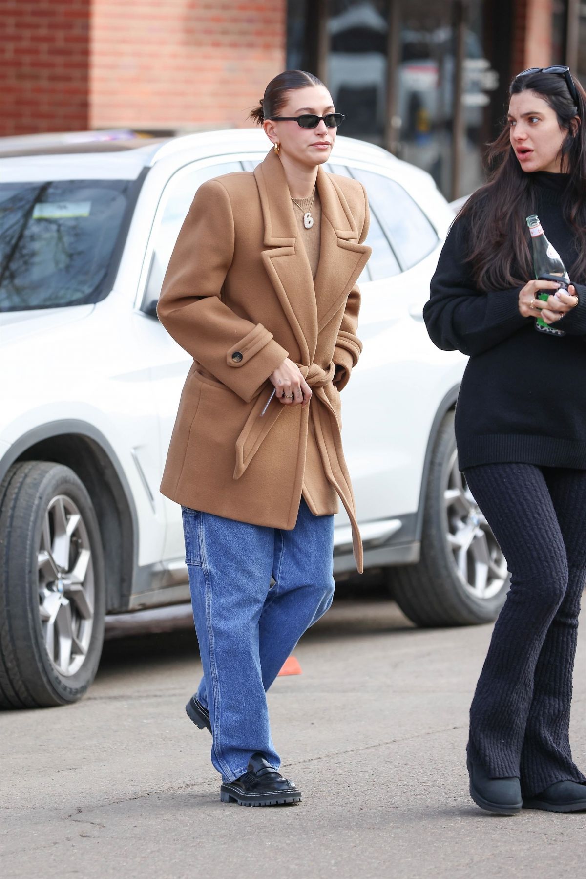Hailey Bieber in Aspen Breakfast Look: Long Brown Jacket & Denim Style 3