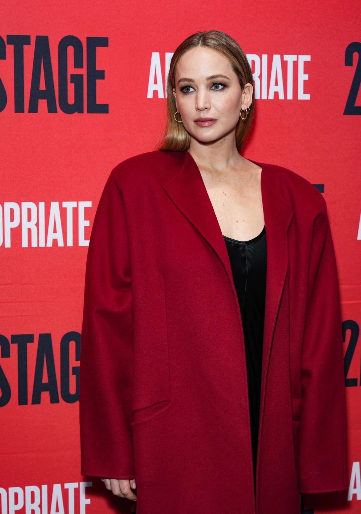 Jennifer Lawrence in Red Overcoat at Appropriate Broadway Opening Night